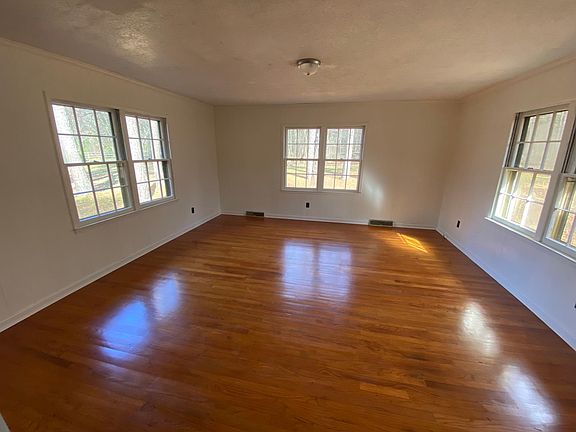 Sun Room (add-on room overlooking backyard) can also be used as a Den extension or office