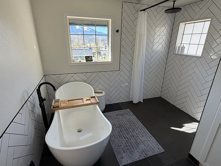Primary BR - ensuite w/ vessel tub and walk-in shower