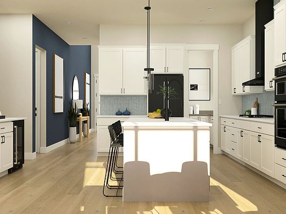 Black stainless steel appliances are included