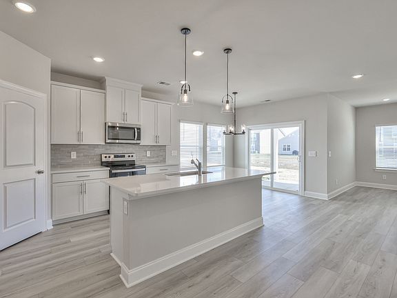 Enjoy your morning coffee at the stunning kitchen island.