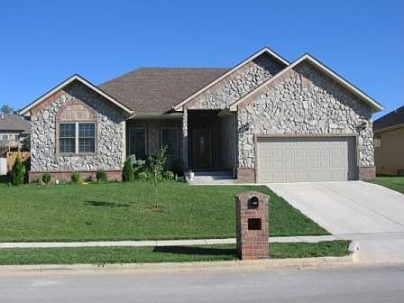 Front of Home w/Beautiful Covered Porch 