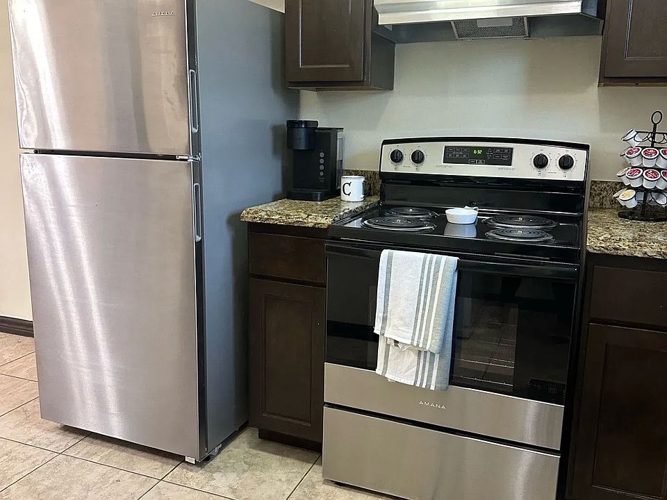 La Joya Apartments Interior Kitchen Room with Stove and Fridge View