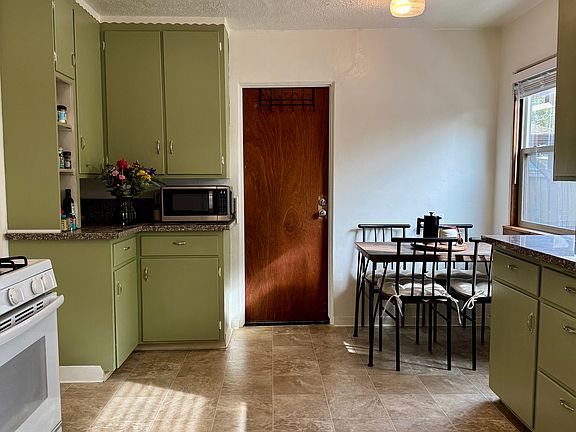 View from living room into kitchen/dining area.