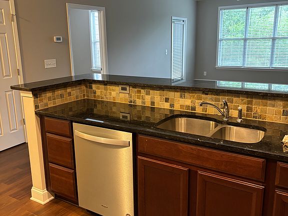 Kitchen view into Living room and 2nd Bedroom