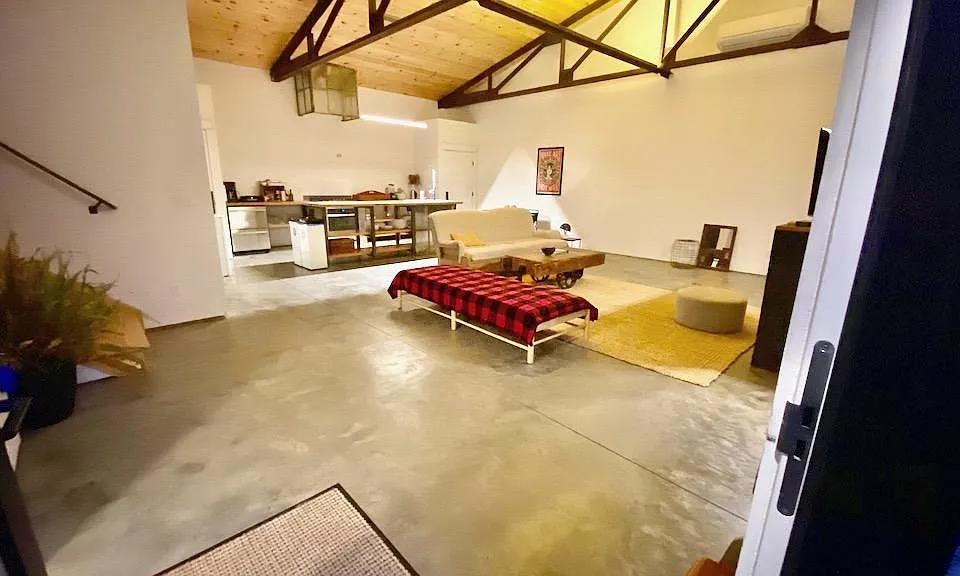 Living Area with Kitchen Area in Background