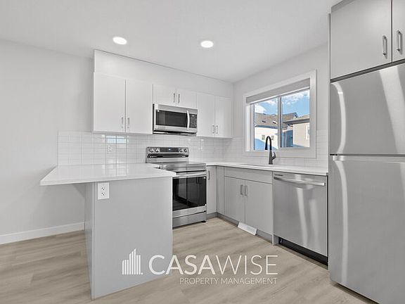 2nd image of 10250G 157th St NW