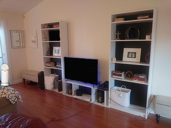 Actual living room with laminate flooring.