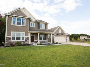 9476 Barber Lake Ct SE, Alto, MI 49302