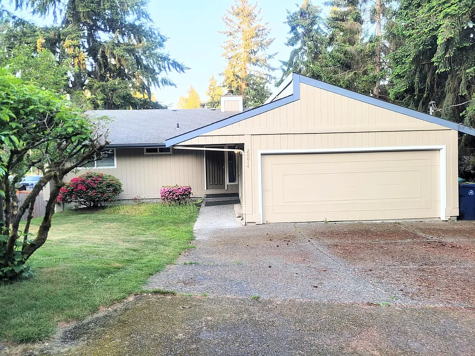 Front of property - 2 car garage, 4 car driveway - 6 reserved private parking spots total