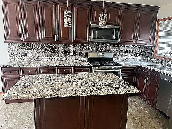 2nd image of 9065 W Oaks Ave