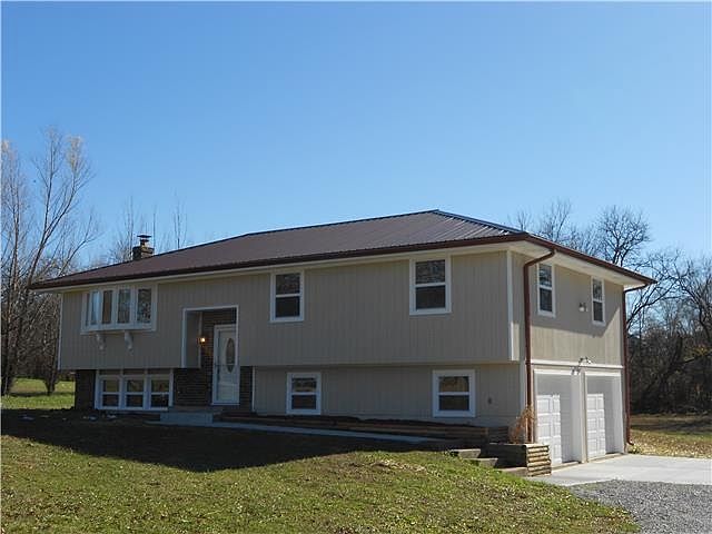 Welcome to 20405 NE 161St Street, Kearney, Missouri.  This wonderfully remodeled home sits on 3.2 acres m/l.  It offers 3 bedrooms and 2.5 baths. Wonderful home for entertaining.