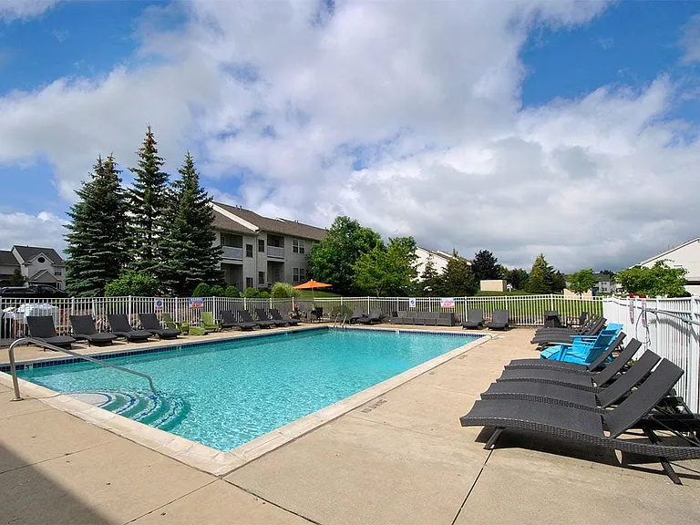 Outdoor Swimming Pool and Loungers