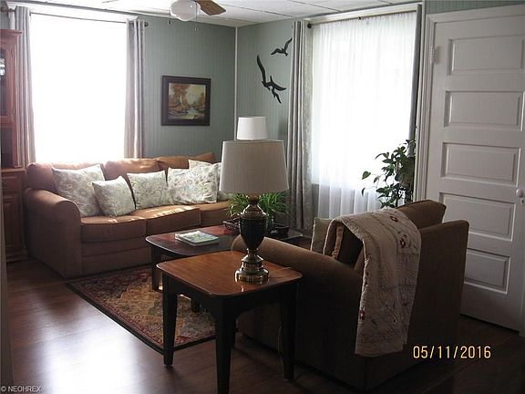 Family room is big enough to change the furniture placement a variety of ways. Comfortable area with plenty of natural light.