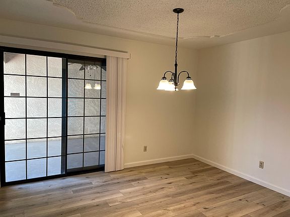 Dining room leading to backyard patio