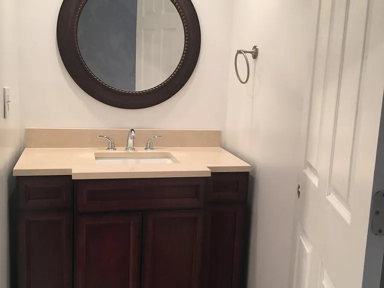 Master bath with designer cabinet and granite top