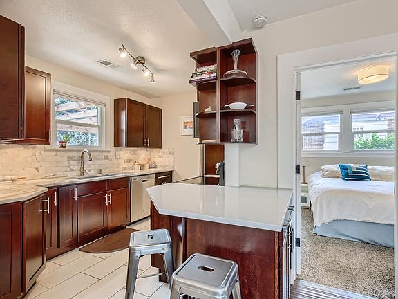 Kitchen with counter-top peninsula and extra storage