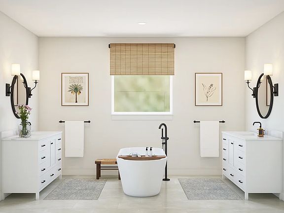 Primary bath with dual vanities and freestanding tub