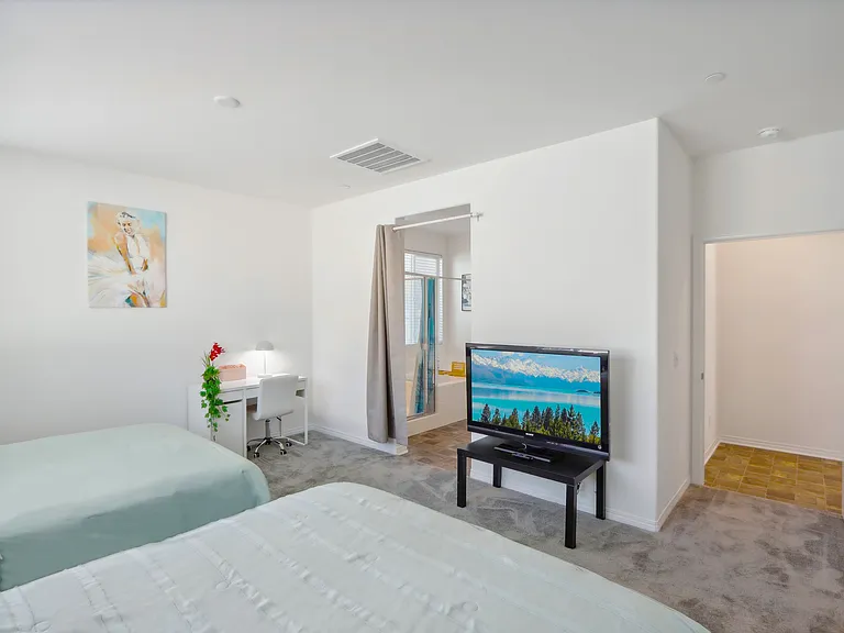 Cozy room featuring a TV for your entertainment!