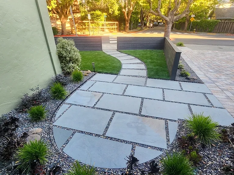 Front yard and permiable paver driveway for up to 3 cars