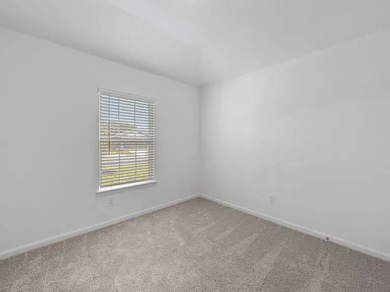 Each bedroom features lush carpet.