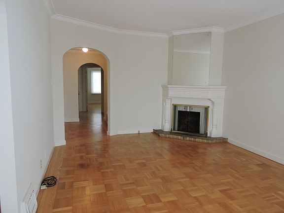 Living Room w/ Decorative Fireplace