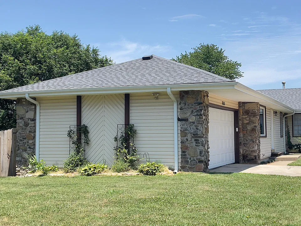 Sideview of Duplex and Fenced Back Yard