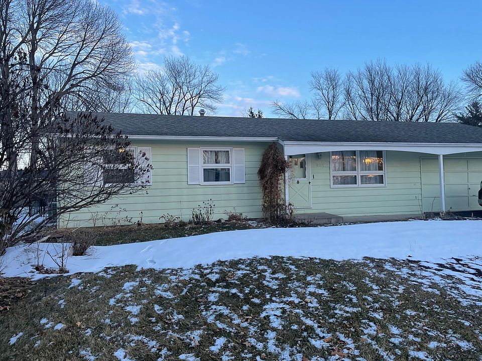 Front . LH windows are each a bedroom . Double windows to the right are the living Room and front entry door to living room