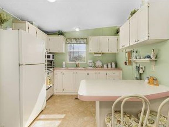 5th image of 10475 Trotwood Ave