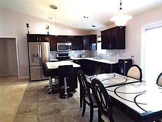 Seller has completely updated their home. New solid surface countertops, new cabinets, tiled backsplash, and all new LG appliances.