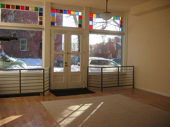 Beautiful Hardwood floors exist under the carpet squares