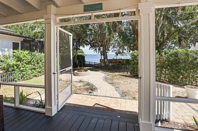 Screened Porch opens to Backyard Fire Pit