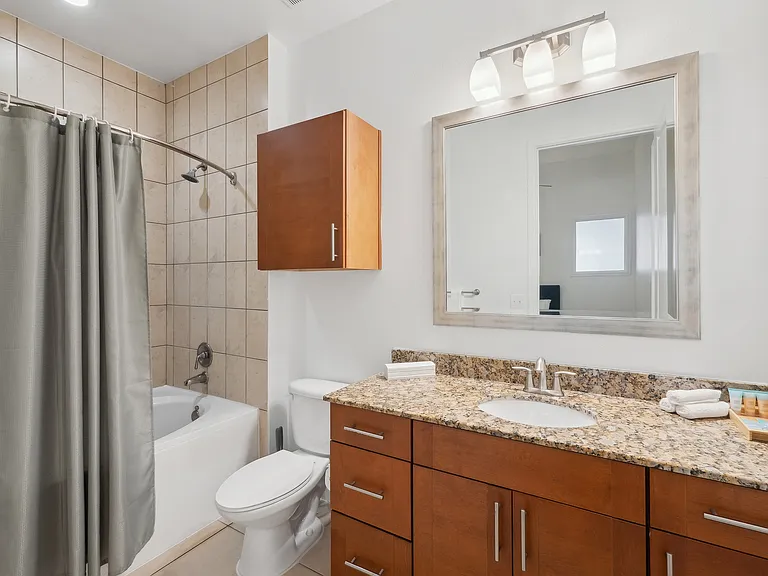 Experience elegance with this beautifully designed bathroom featuring premium finishes. Experience elegance with this beautifully designed bathroom featuring premium finishes.