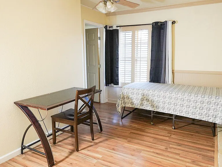 Big Room D with bed and study table and closet for clothes and private bathroom