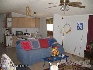 Living room looking into dining area