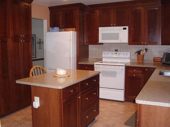 Kit w/cherry cabinets and silestone counters