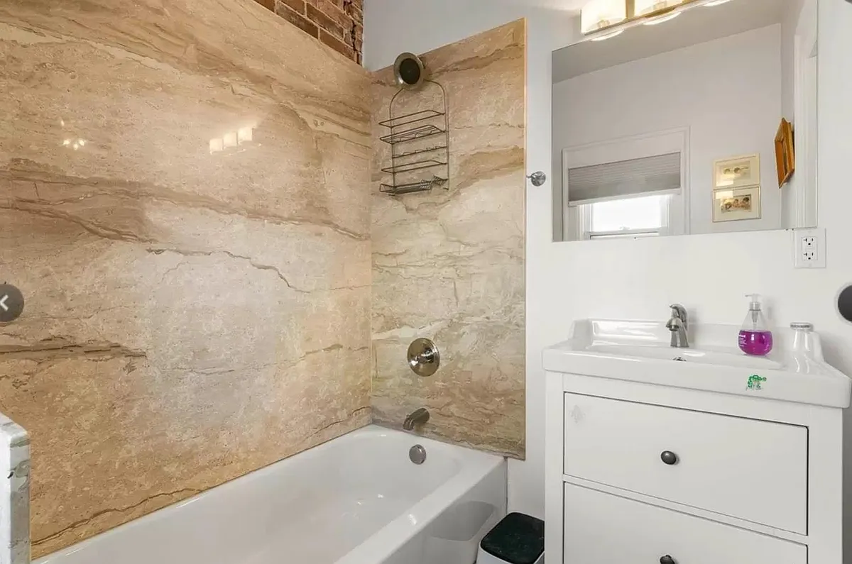 bathroom 1 with full slab solid surfaces & modern vanity - 1748 N High St #2
