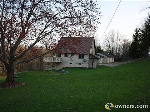 Road side of house- left