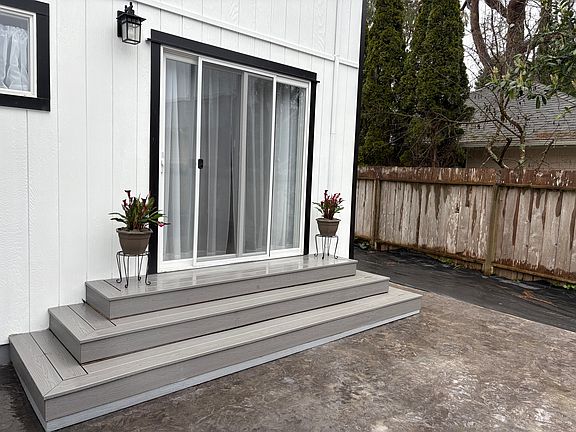Exit from living room to patio and back yard