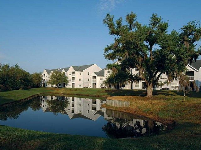 Apartments by a pond