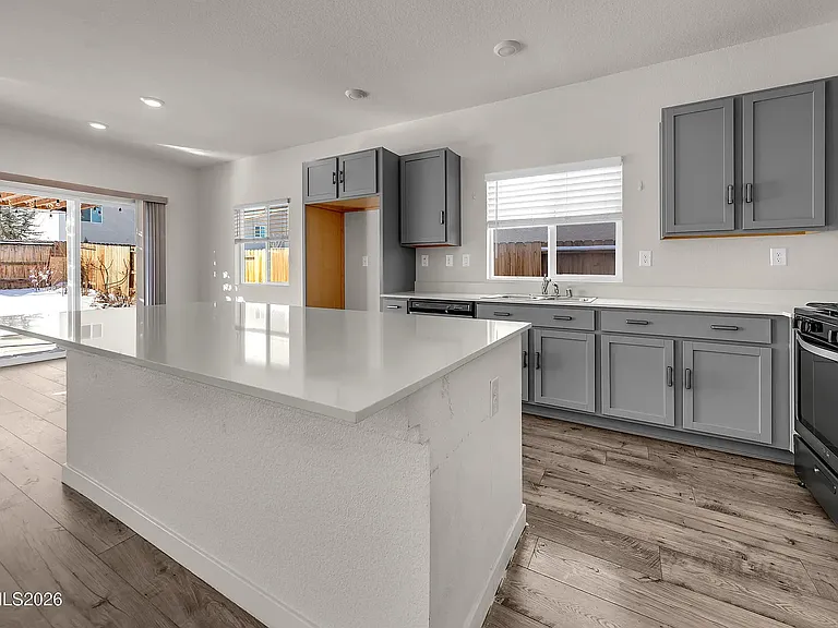Kitchen (this is a staged photo; kitchen is furnished)