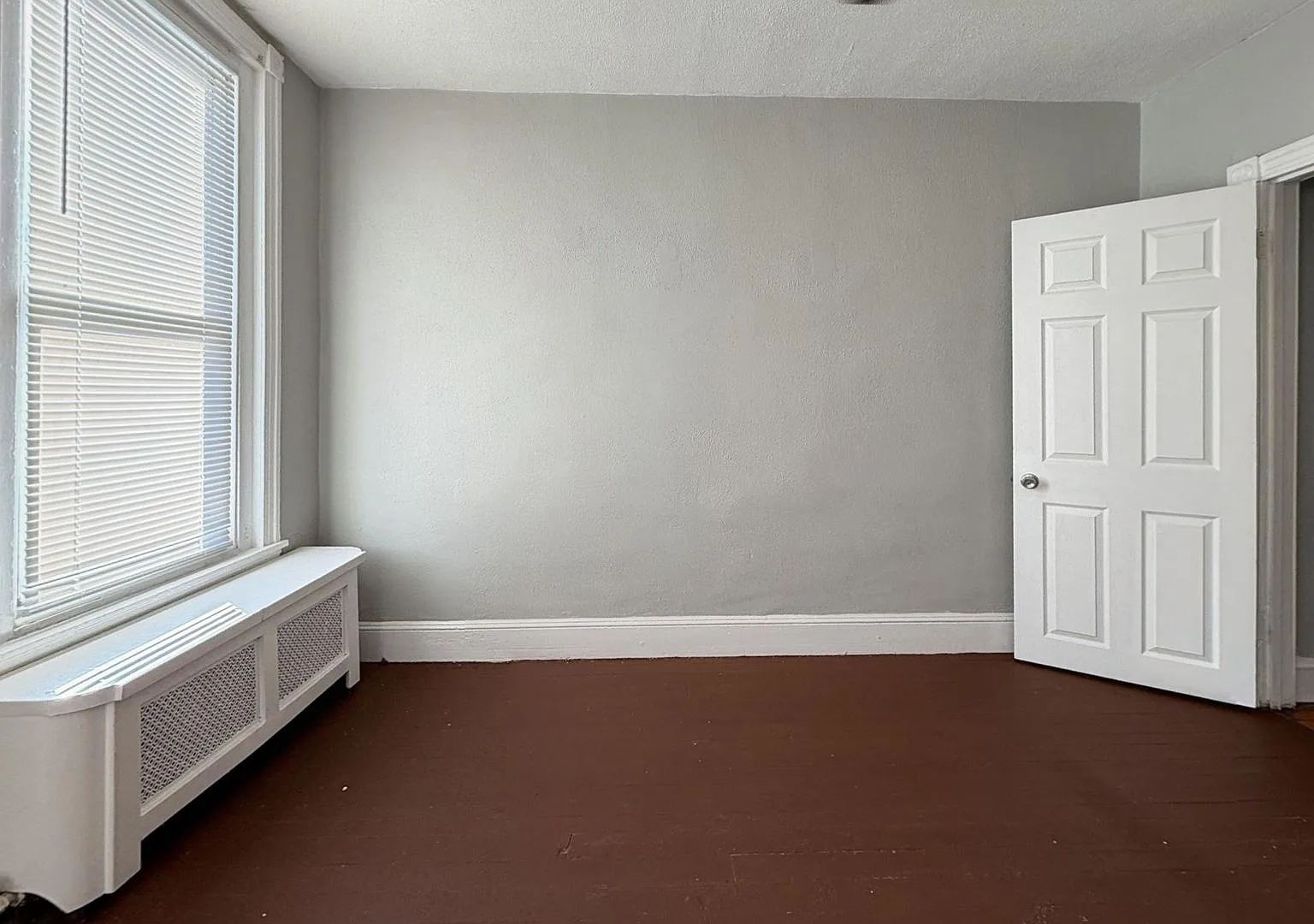 Classic 2-BR Rowhouse with Exposed Brick in Hunting Park — Photo 4