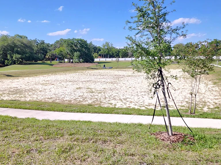 No neighbors on the back of the house. Enjoy a nice walk around the dry pond and the playground area.