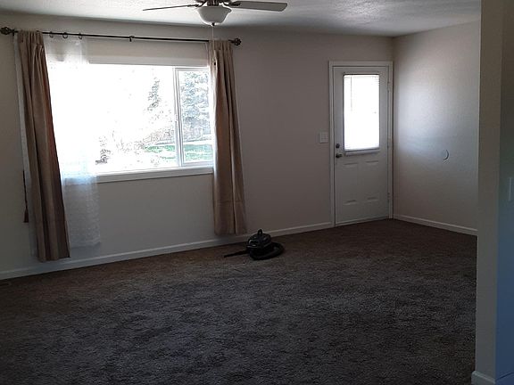 LOOKING INTO LIVING ROOM FROM KITCHEN AREA
