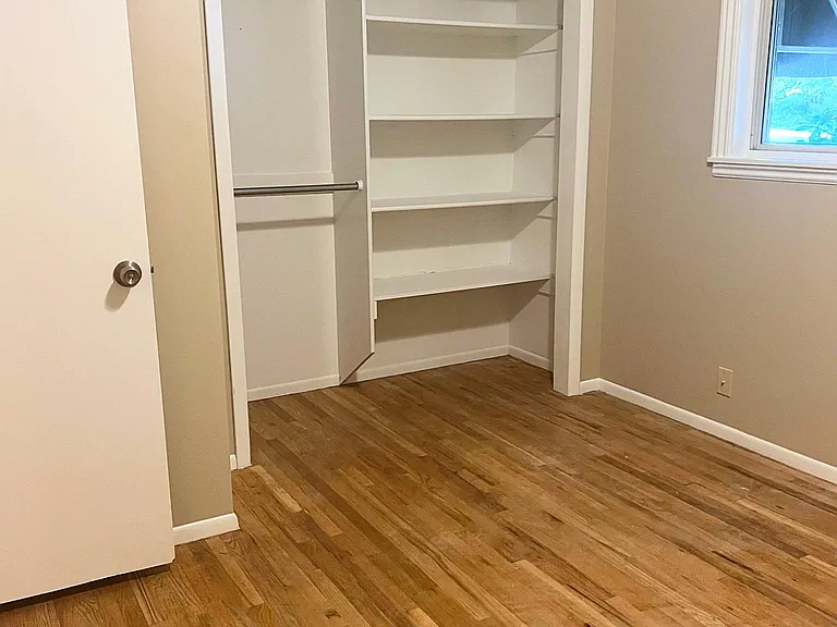 Front Bedroom #1 closet organizer.