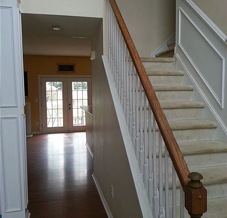 Open the door, view all the way back to the french doors.