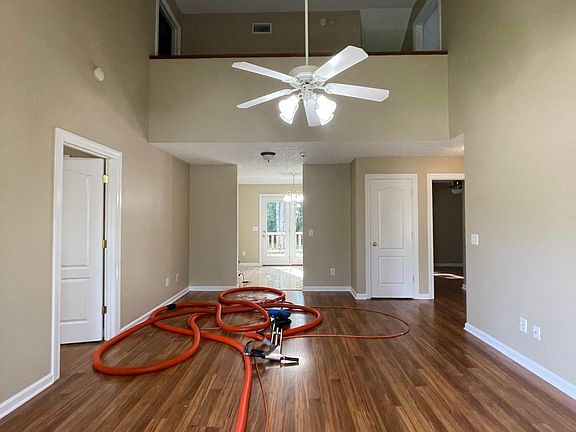 Nice open great room master bedroom to the left others to the right staircase