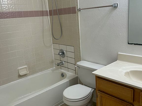 Upstairs bathroom with tub.