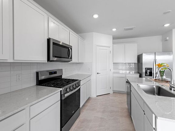 Chef-inspired kitchen with designer finishes