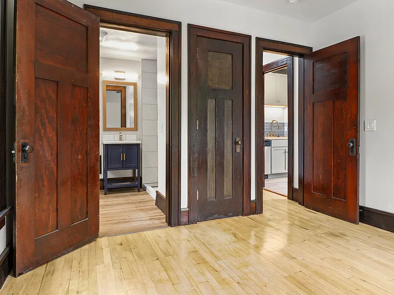 This is the back bedroom and it has its own bathroom. THe bedrooms are a "just right" in a well situated home.