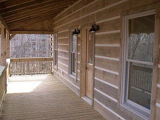 The covered front porch awaits your rocking chair!